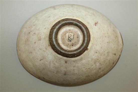 Dame Lucie Rie D.B.E. (1902-1995). A stoneware elliptical bowl, 20cm across, firing imperfection to one side